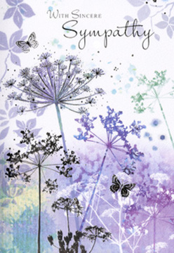 The artistry inside this sympathy card is subtle and contemplative, evoking the hush you might feel stepping into a calm corner of New Cross's green spaces on a hazy morning. Slender stems of wildflowers rise from the base of the image, each topped with delicate, umbel-shaped heads rendered in fine, almost feathery detail. Soft violets, muted indigo, and gentle lilac blend with cool, silvery greens, all laid down in transparent watercolor layers that allow the paper's texture to breathe through the colour. Some blossoms lean slightly, as if caught mid-sway, while others stand tall and upright, creating a natural, unforced rhythm across the card. Transparent butterflies drift among the blooms, their wings in pale lavender and soft blue barely distinguished from the background, as if they've just fluttered in on a light breeze from nearby parks. Behind them, the background is a field of calm, with washes of dusky purple and powder blue that gently blur into one another, suggesting distance and quiet without any hard edges. The mood is one of reflection and gentle support, much like the feeling I aim to convey when arranging sympathy flowers for families in New Cross-present, tender, but never overwhelming. At the top or alongside the floral illustration, a simple, sincere message is written in elegant script, its curves echoing the natural lines of the stems below. Together, the words, flowers, and butterflies create a composition that feels like a soft-spoken embrace, a way of saying, "You're not alone in your grief," with quiet grace and compassion.